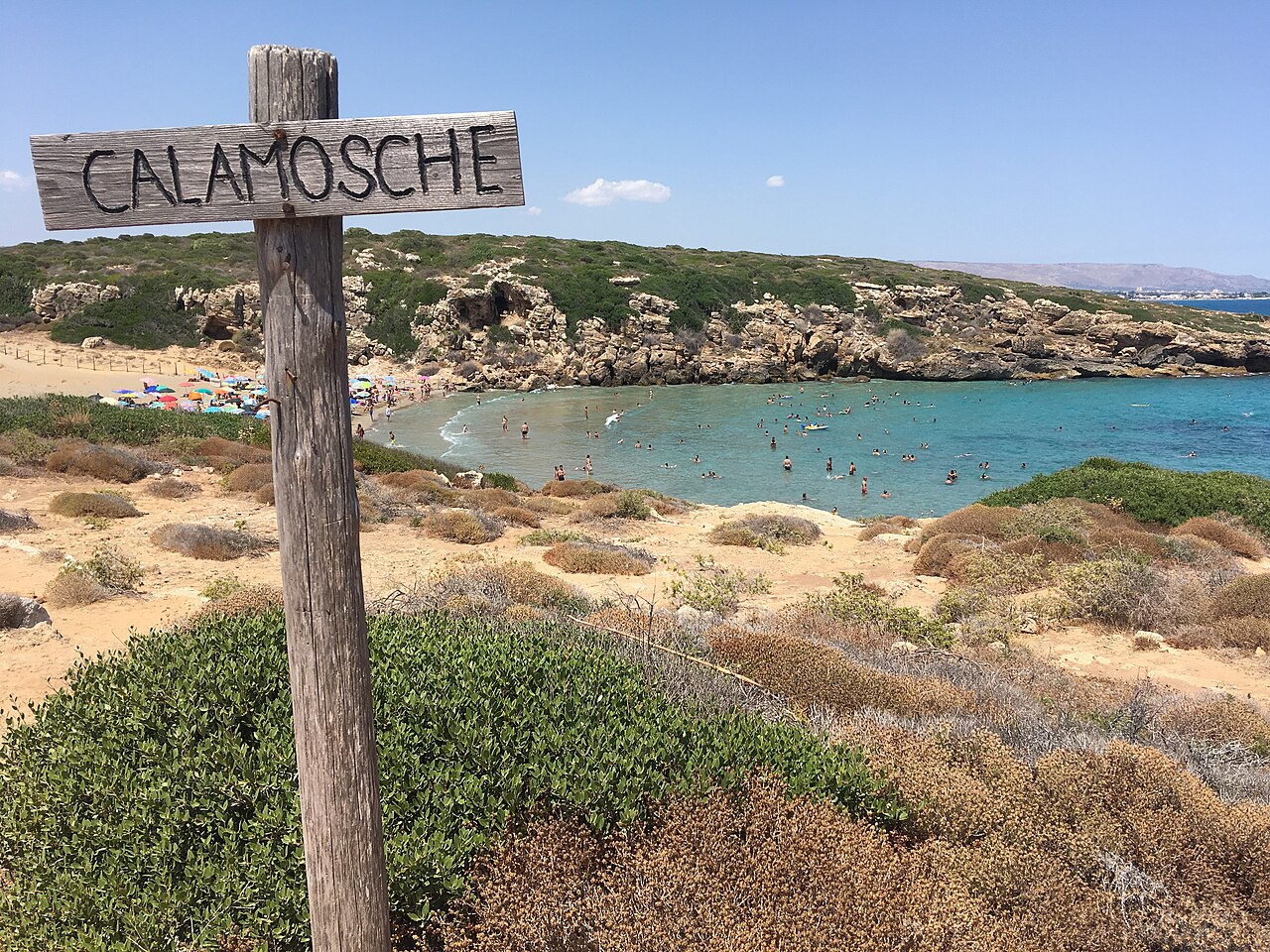 view of the calamosche beach